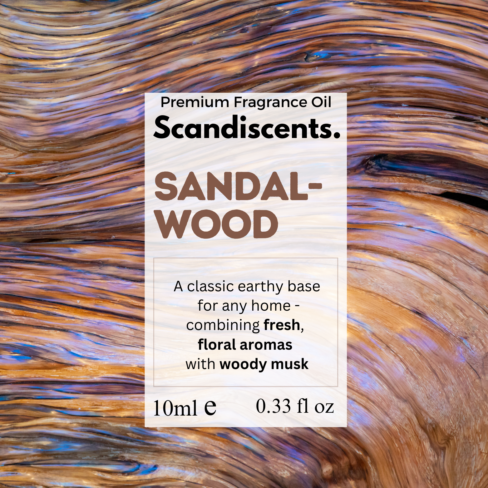 Scandiscents sandalwood fragrance oil packaging on a sandalwood background