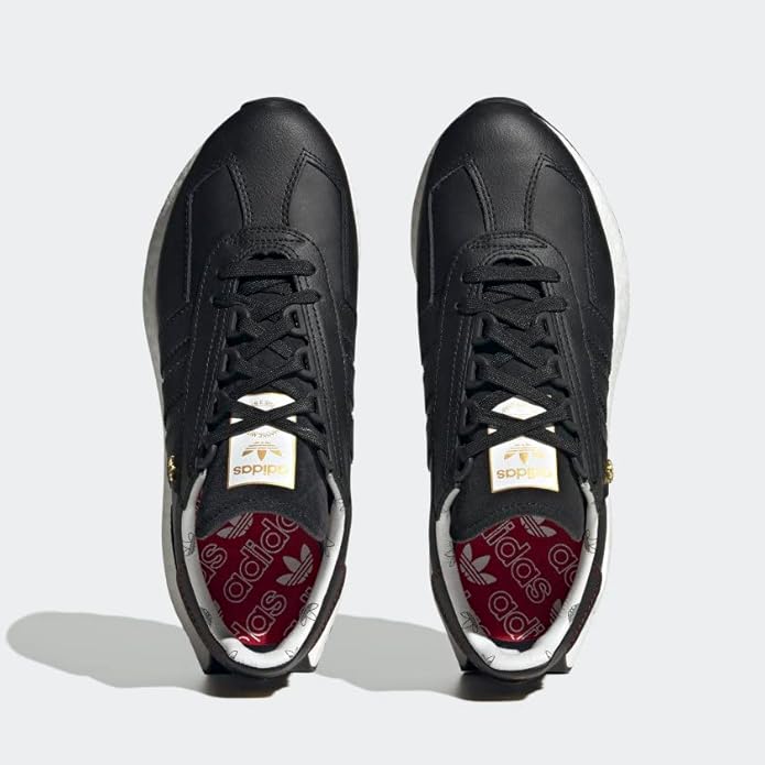 Black Adidas sneakers shown from front and back on a light gray background