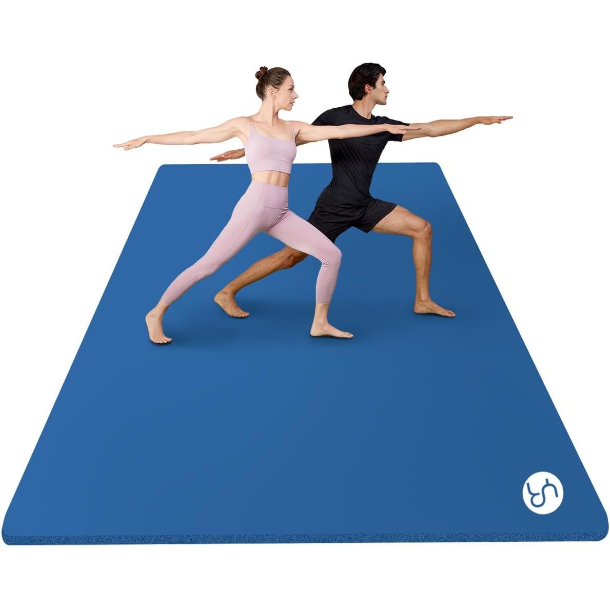 Two people in a yoga pose on a blue mat with a visible brand logo.