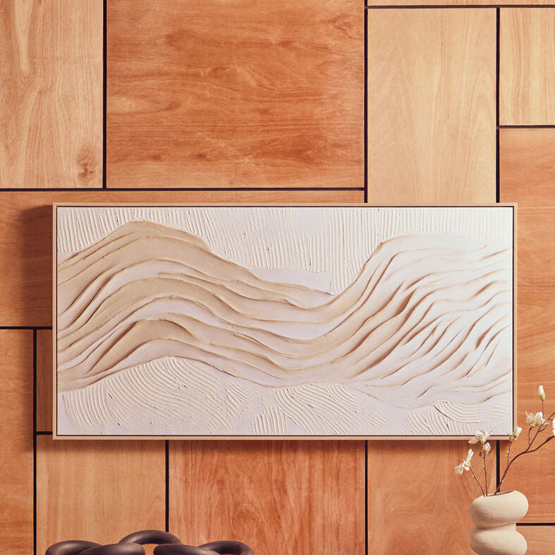 Decorative wall art with wavy patterns on a wooden panel background