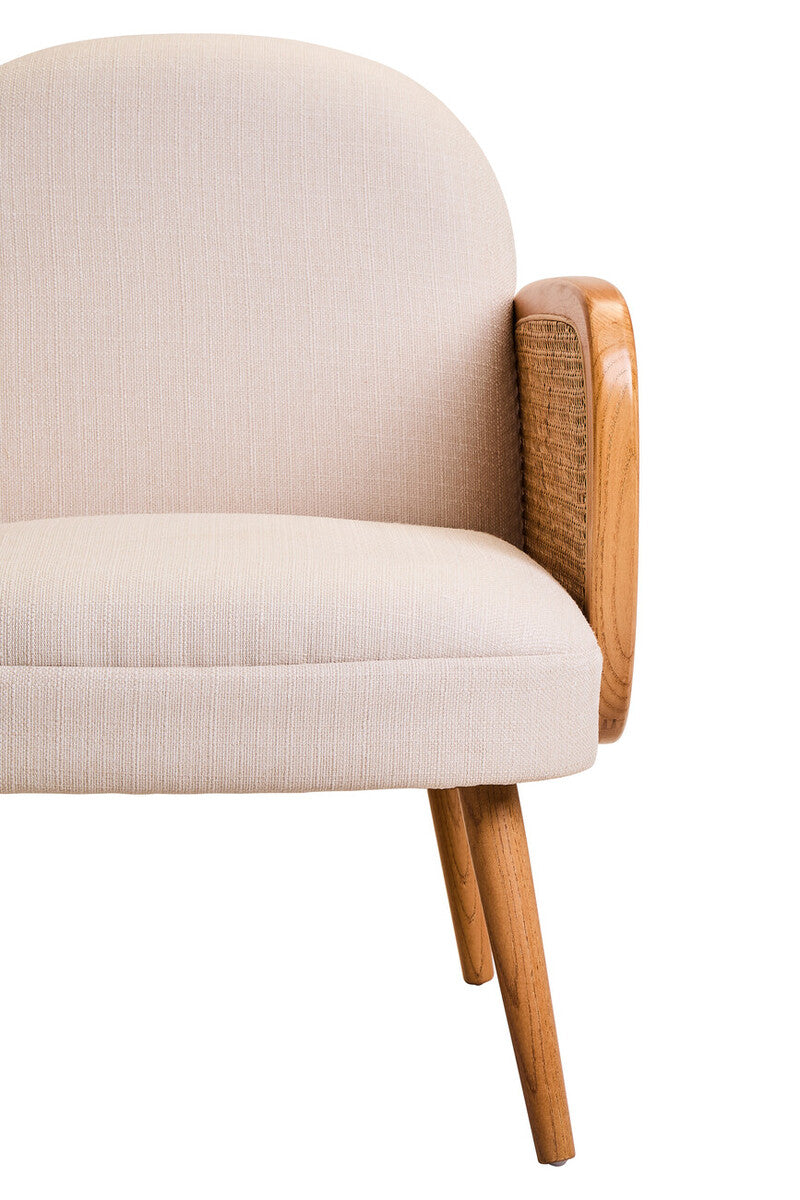 Beige armchair with wooden armrests on a white background