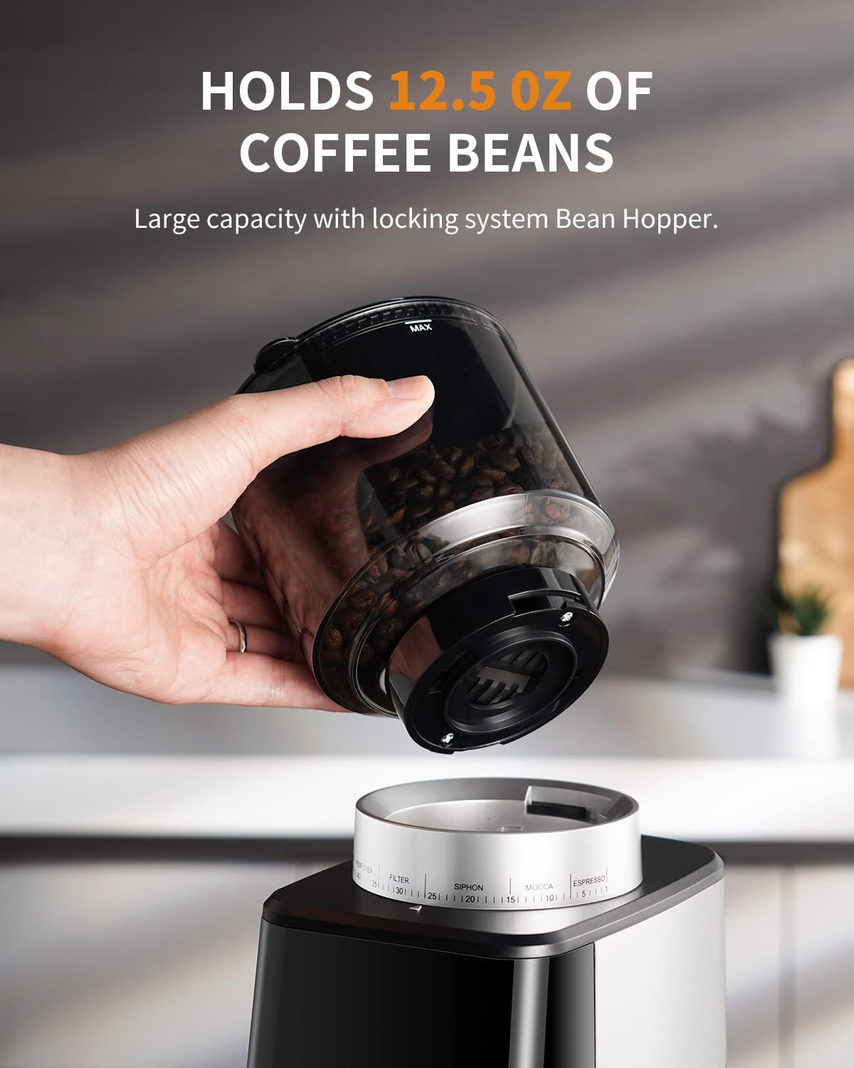Hand holding a coffee bean hopper with text indicating capacity and locking system.