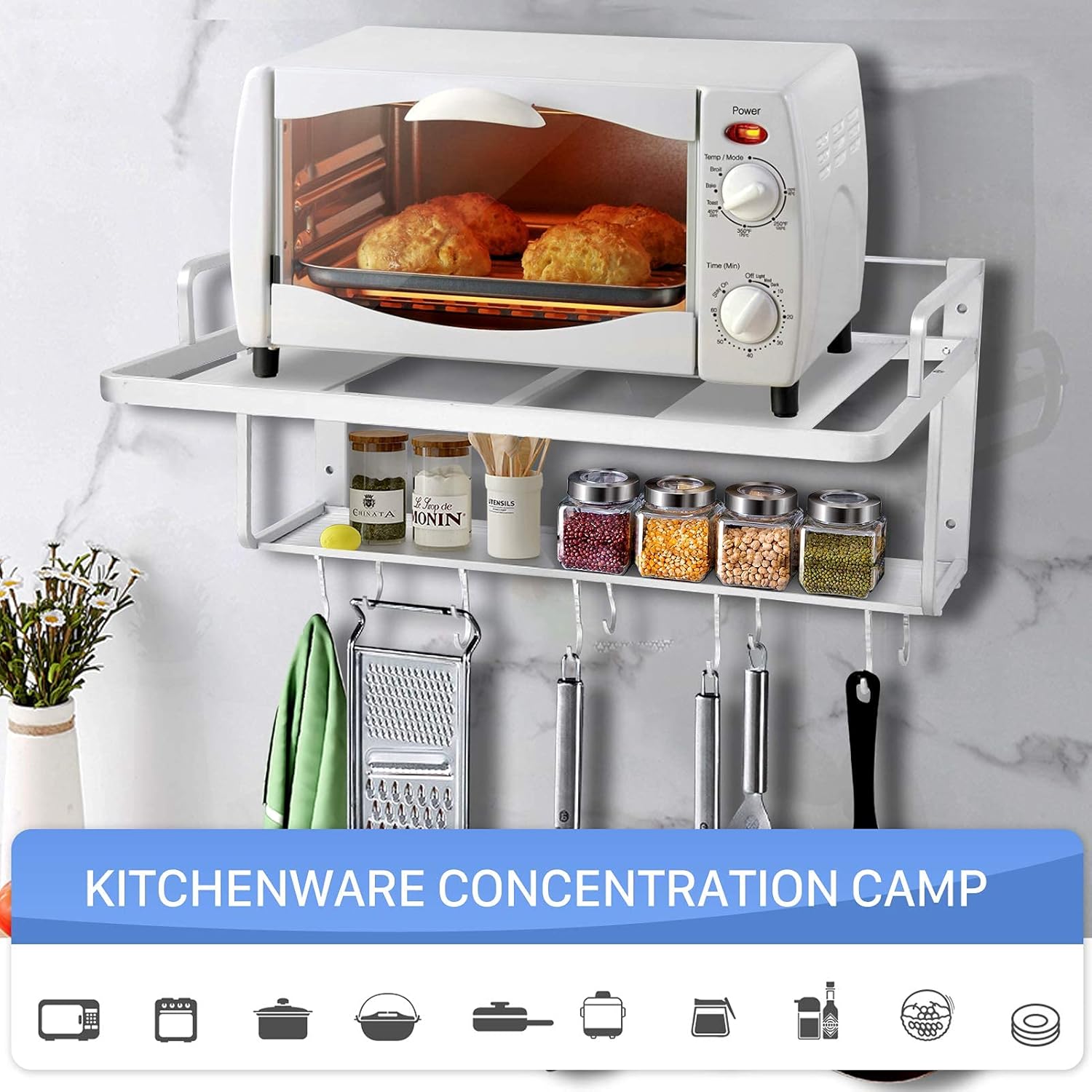 Wall-mounted toaster oven with shelf and spice jars on a white marble countertop.