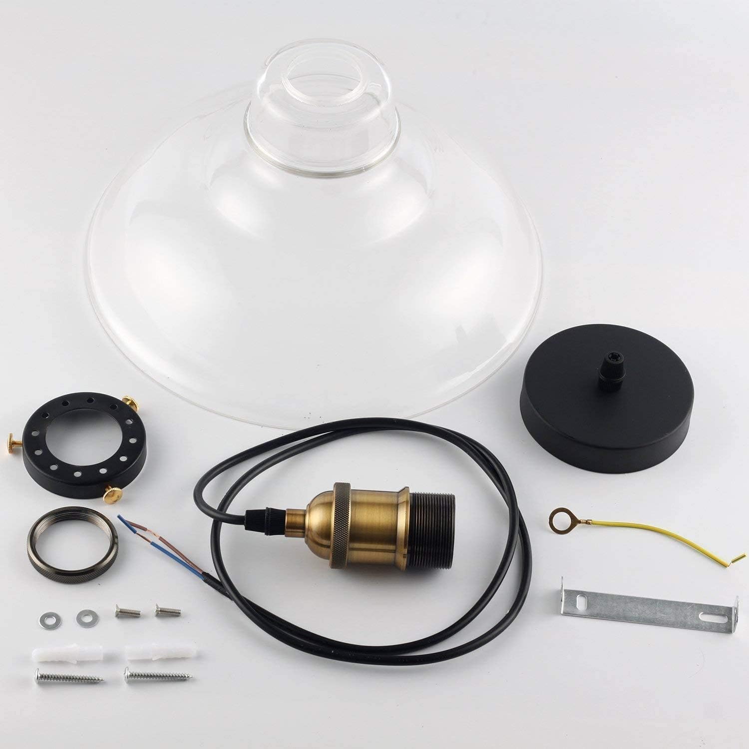 Lamp parts including a glass shade, metal components, and wiring on a white background