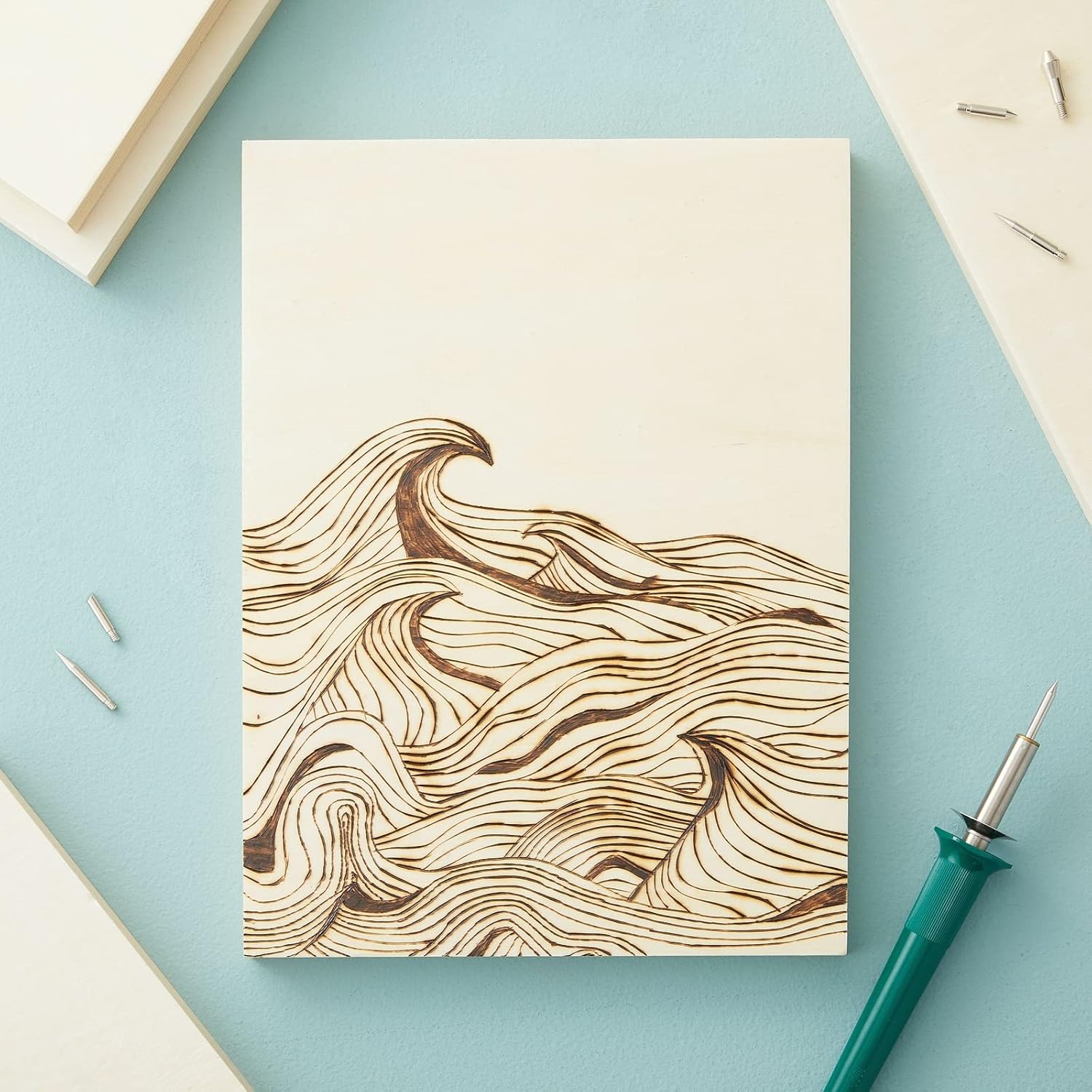 Notebook with wave design on a light blue background