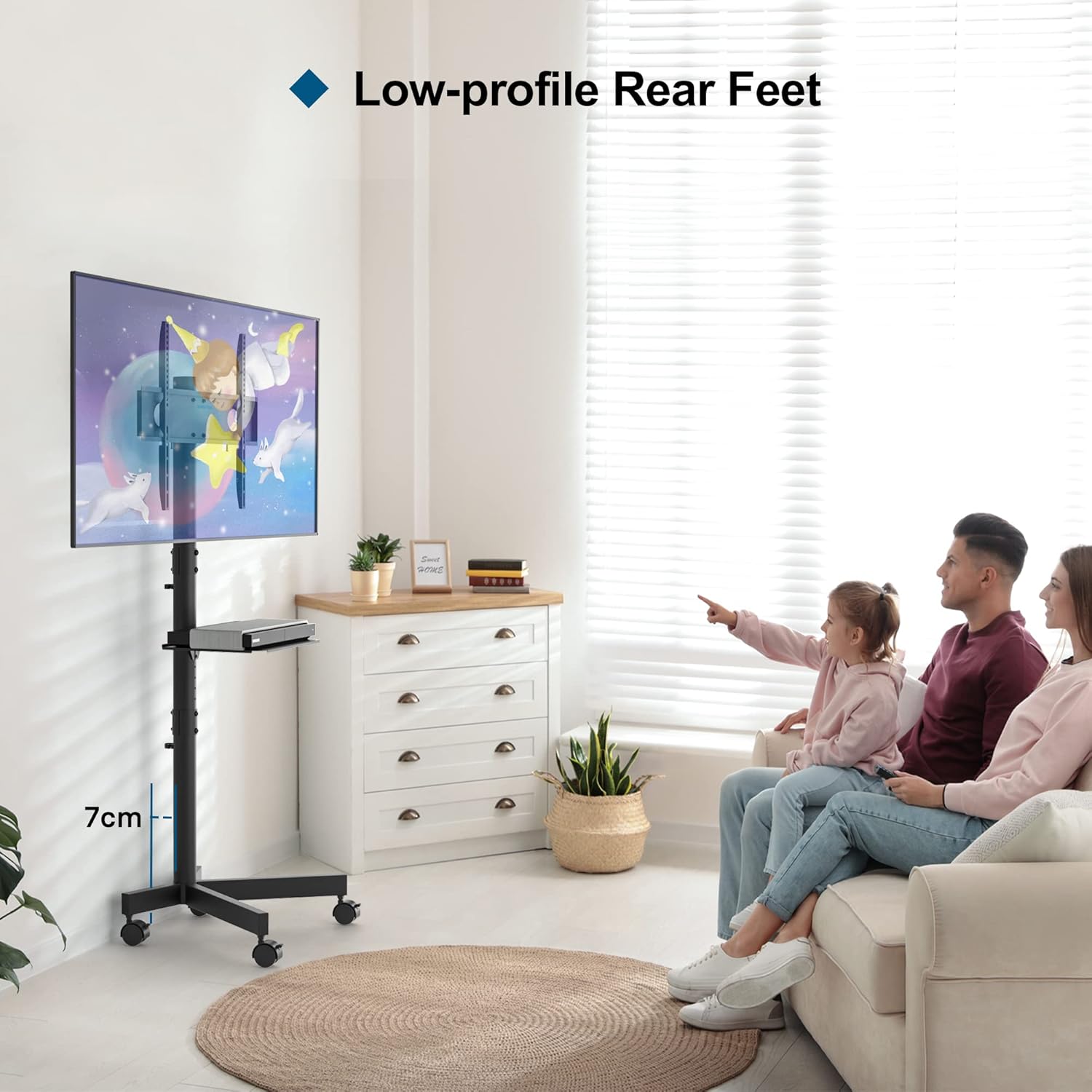 Family watching TV on a stand in a living room with low-profile rear feet feature highlighted.