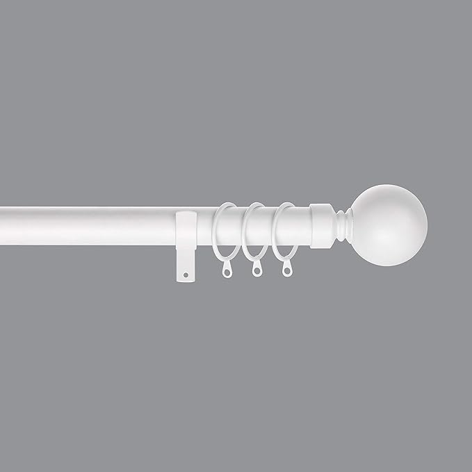 Curtain rod with spherical finial on a gray background