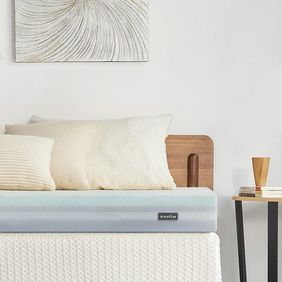 Inofia single mattress topper with cooling gel and charcoal foam offers comfort, support, breathability, and pressure relief. Hypoallergenic cover.