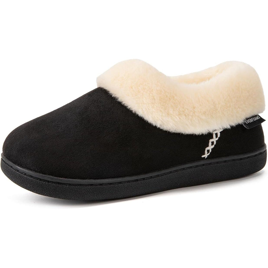 Black slipper with beige fur lining on a white background