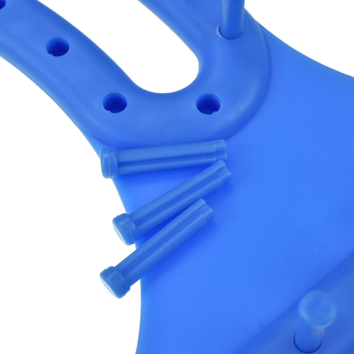 Blue plastic component with cylindrical holes on a white background
