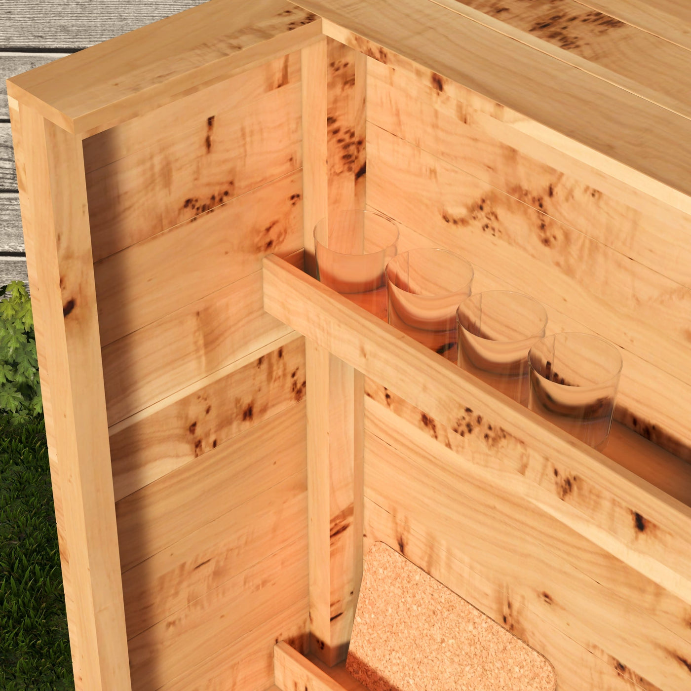 Wooden planter box with clear plastic cups inside, on a wooden surface.
