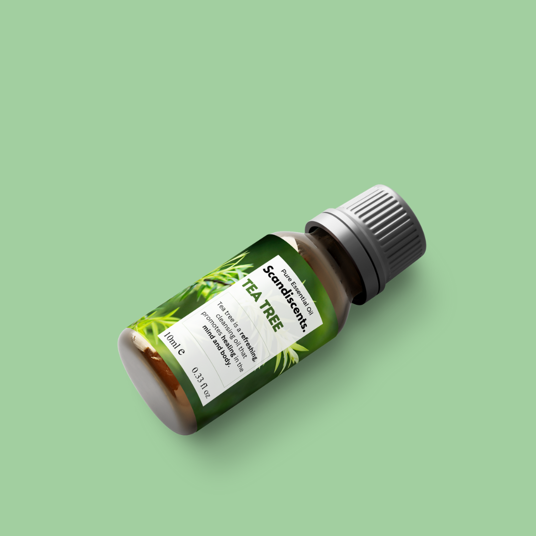 Bottle of Scandikents Tea Tree oil on a green background
