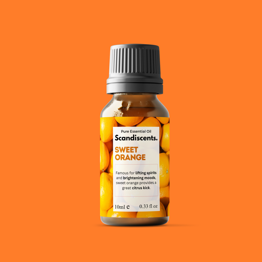 Scandiscent's sweet orange essential oil bottle on an orange background