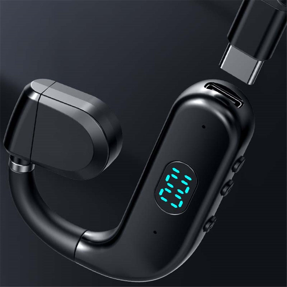 Black wireless earbuds with digital display on a dark background