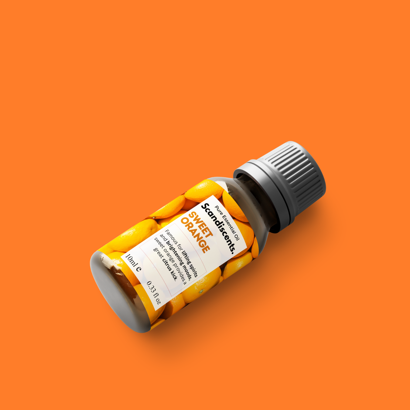 Small bottle of Scandiccentr Sweet Orange essential oil on an orange background