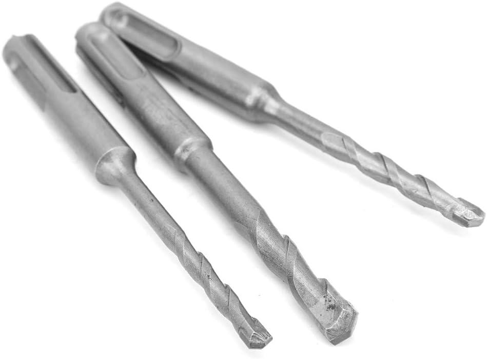 Three drill bits on a white background