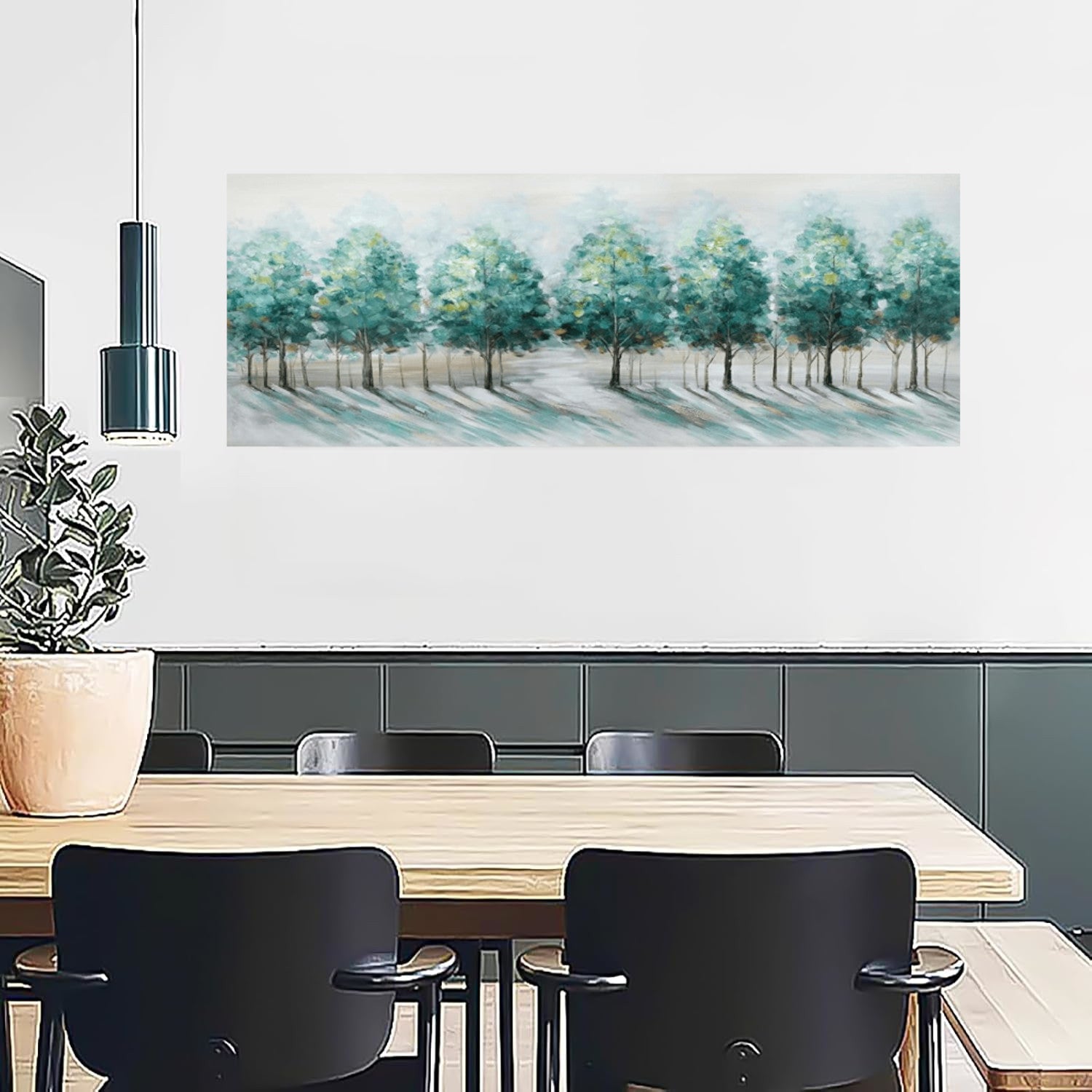 Modern interior with a long dining table and chairs, featuring a wall art of trees.