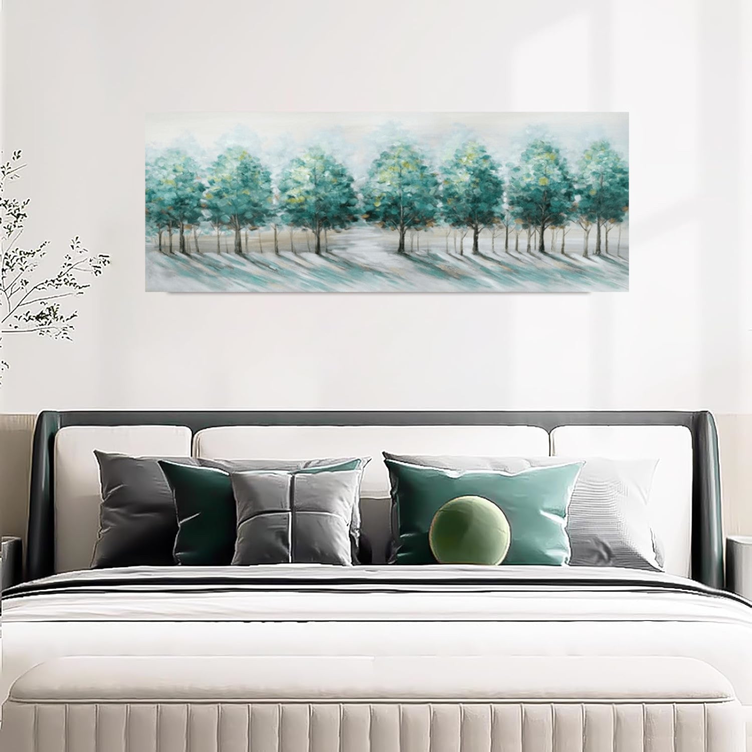 Bedroom with a bed featuring decorative pillows and a large abstract painting of trees on the wall.