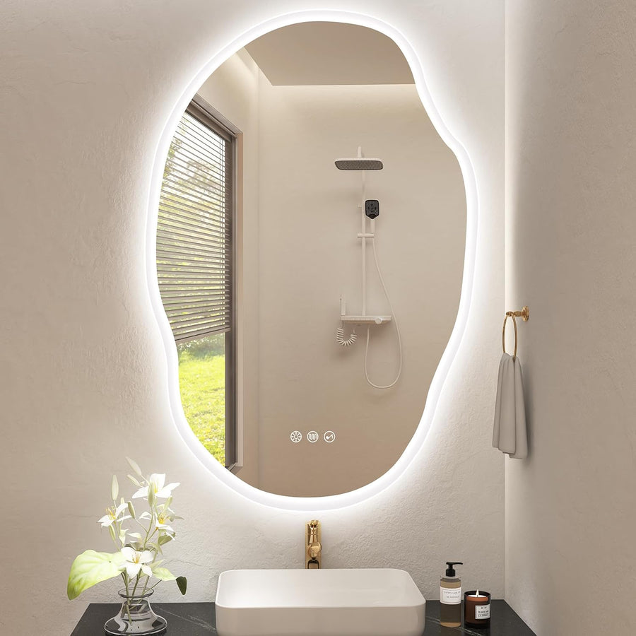 Bathroom with a round illuminated mirror, sink, and decorative elements.