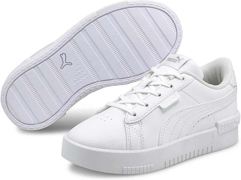 White sneakers with a visible Puma logo on a white background