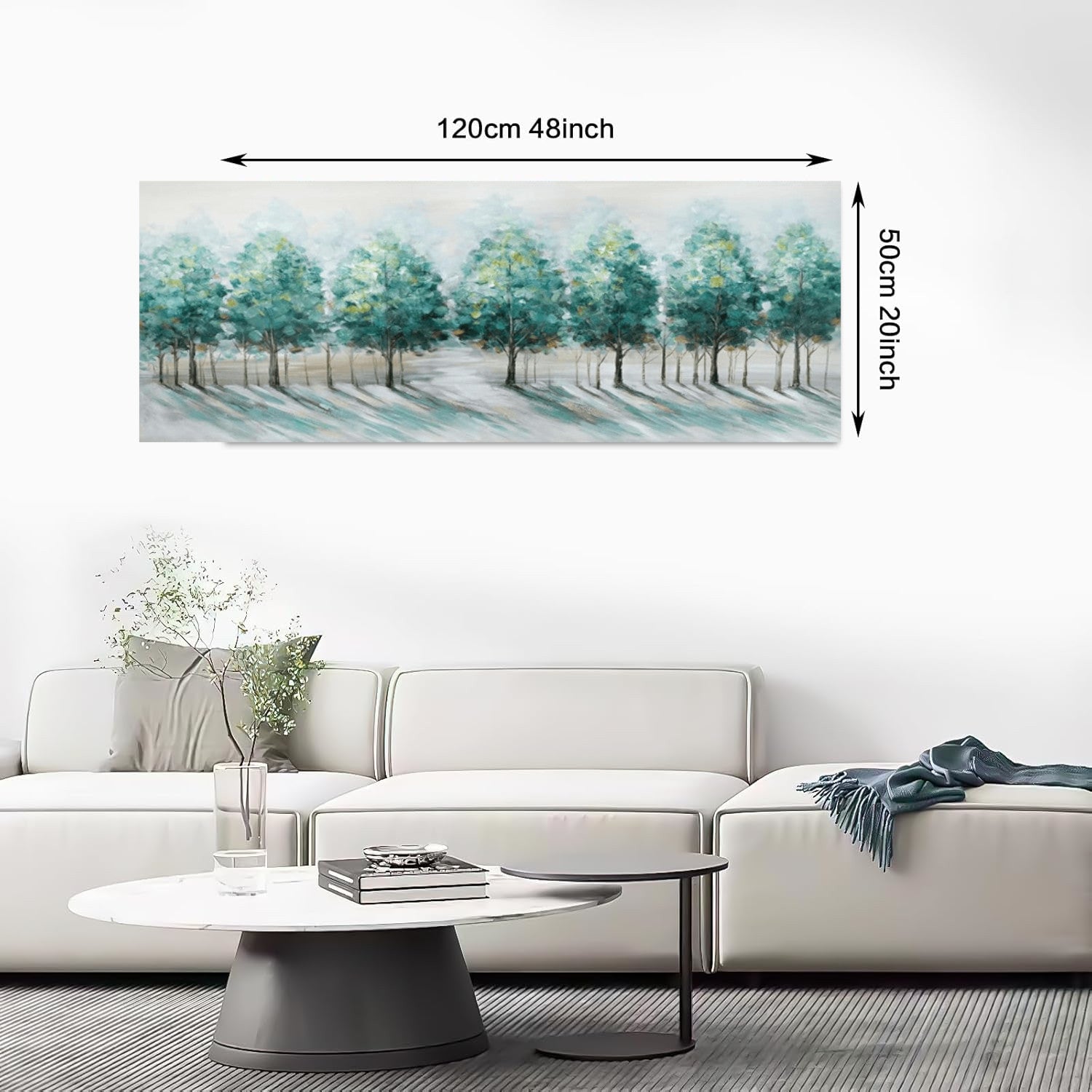 Framed artwork of a forest scene with dimensions displayed above a living room setting.