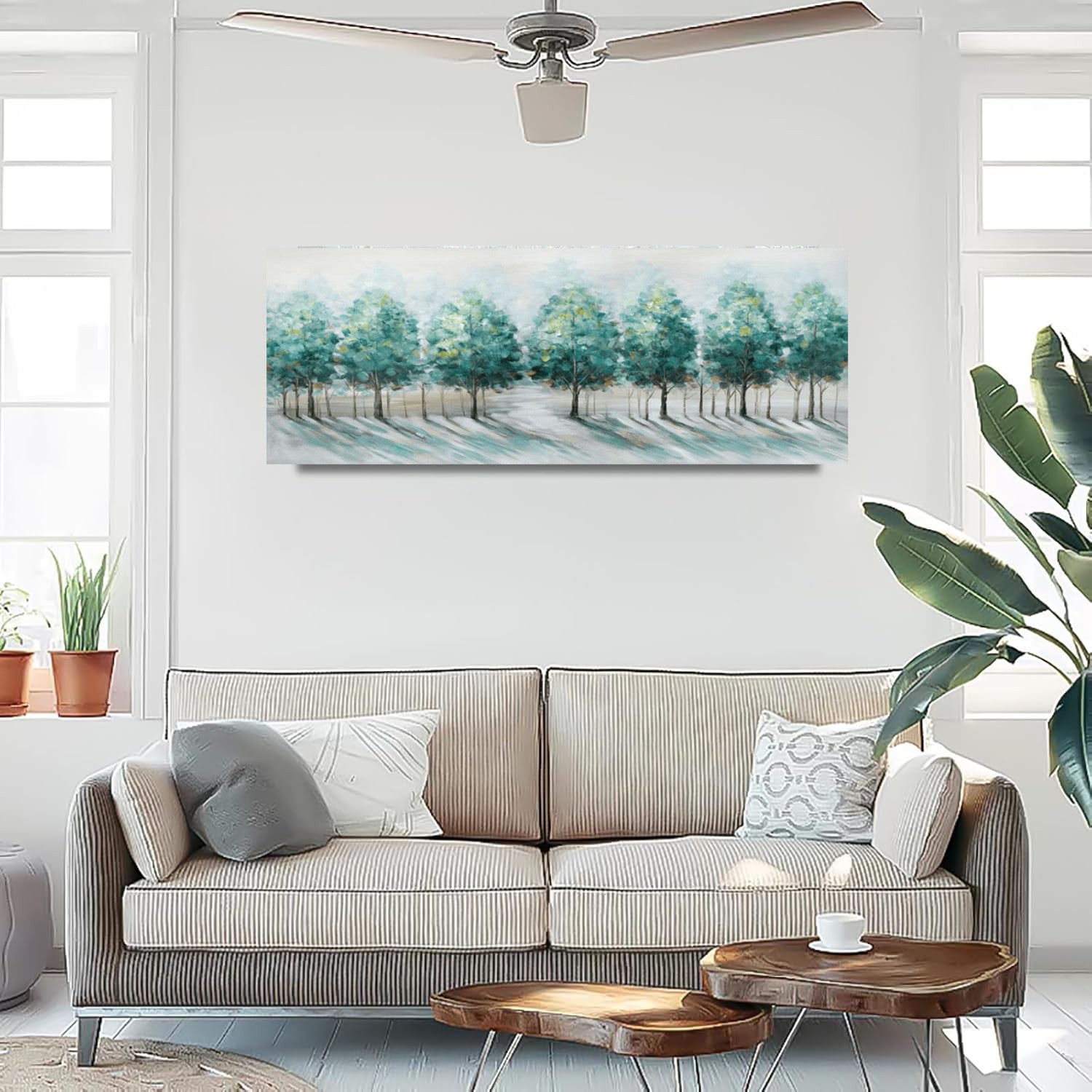 Living room with a beige sofa, wooden coffee table, and a large abstract landscape painting on the wall.