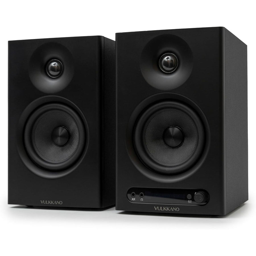 Pair of black Vulkano speakers on a white background