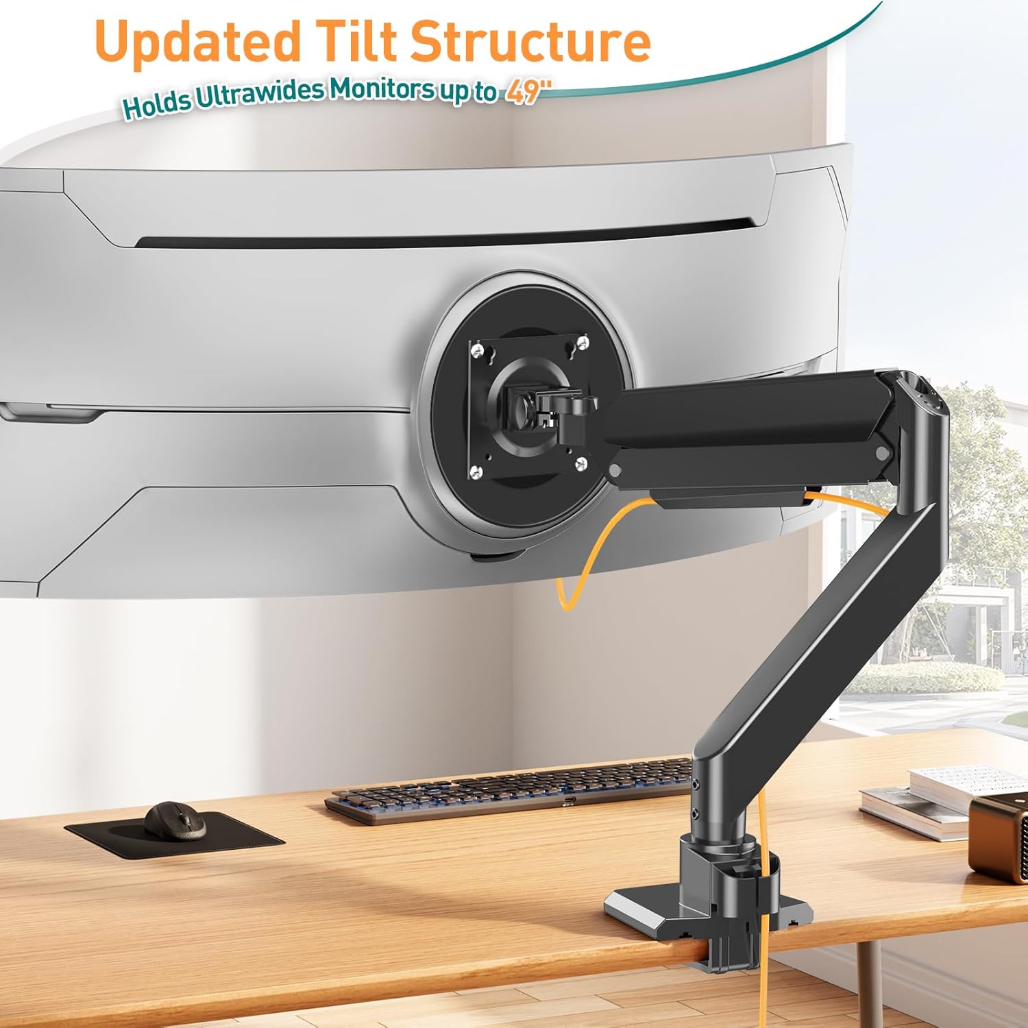 Monitor stand with adjustable arm on a desk, featuring text about updated tilt structure.