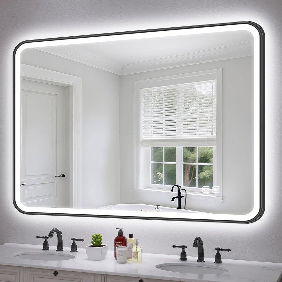 Bathroom vanity with large illuminated mirror, sink, and toiletries.