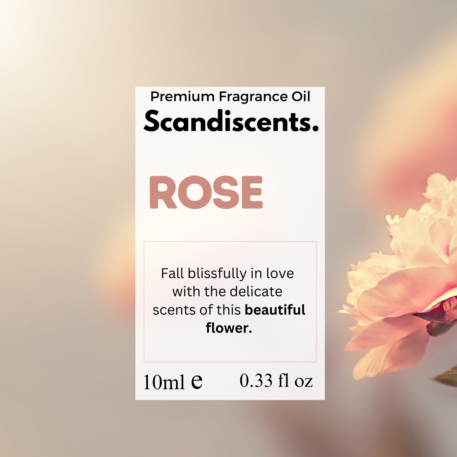 Scandiscents Rose fragrance oil packaging with a blurred flower in the background