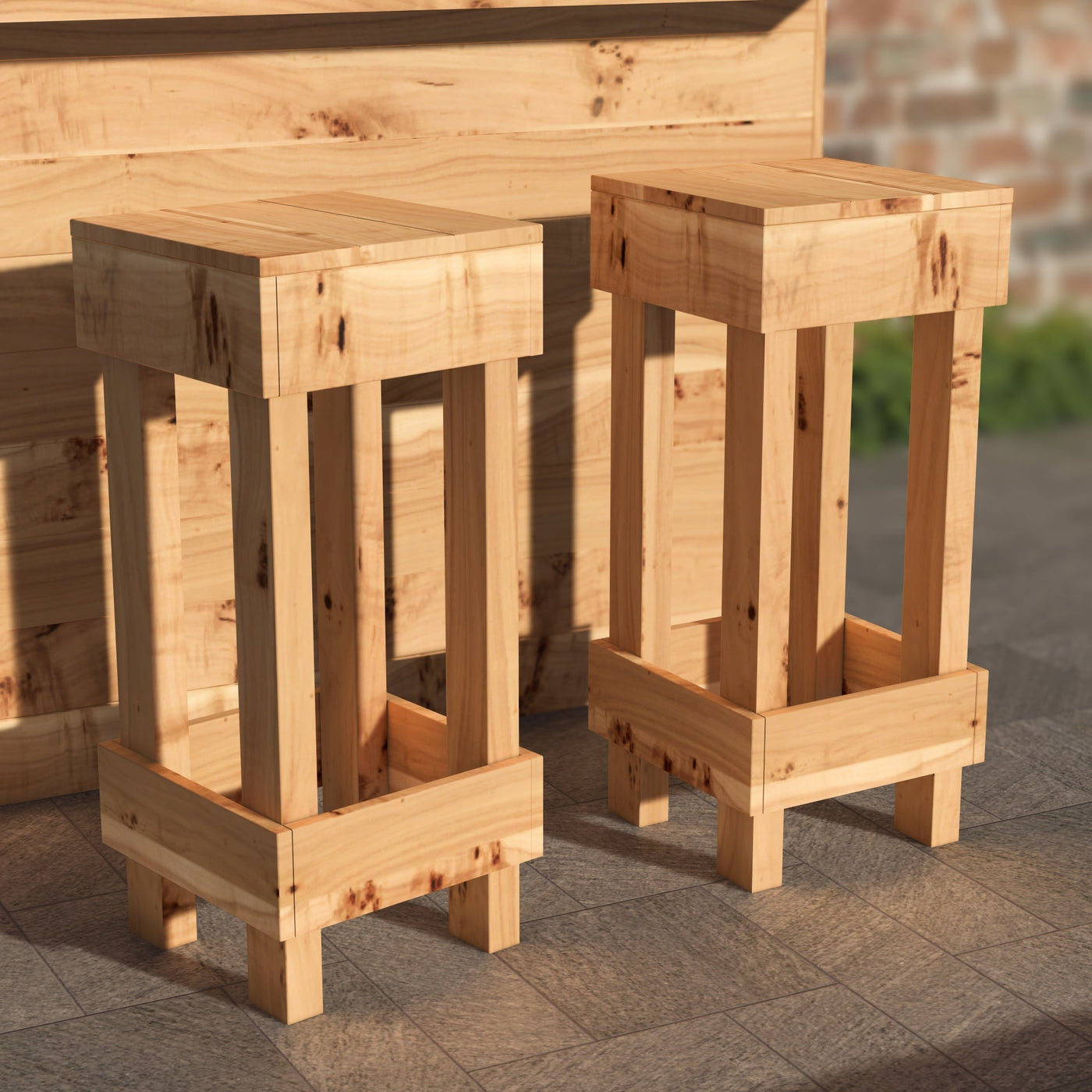 Two wooden stools on a stone pavement with a blurred background