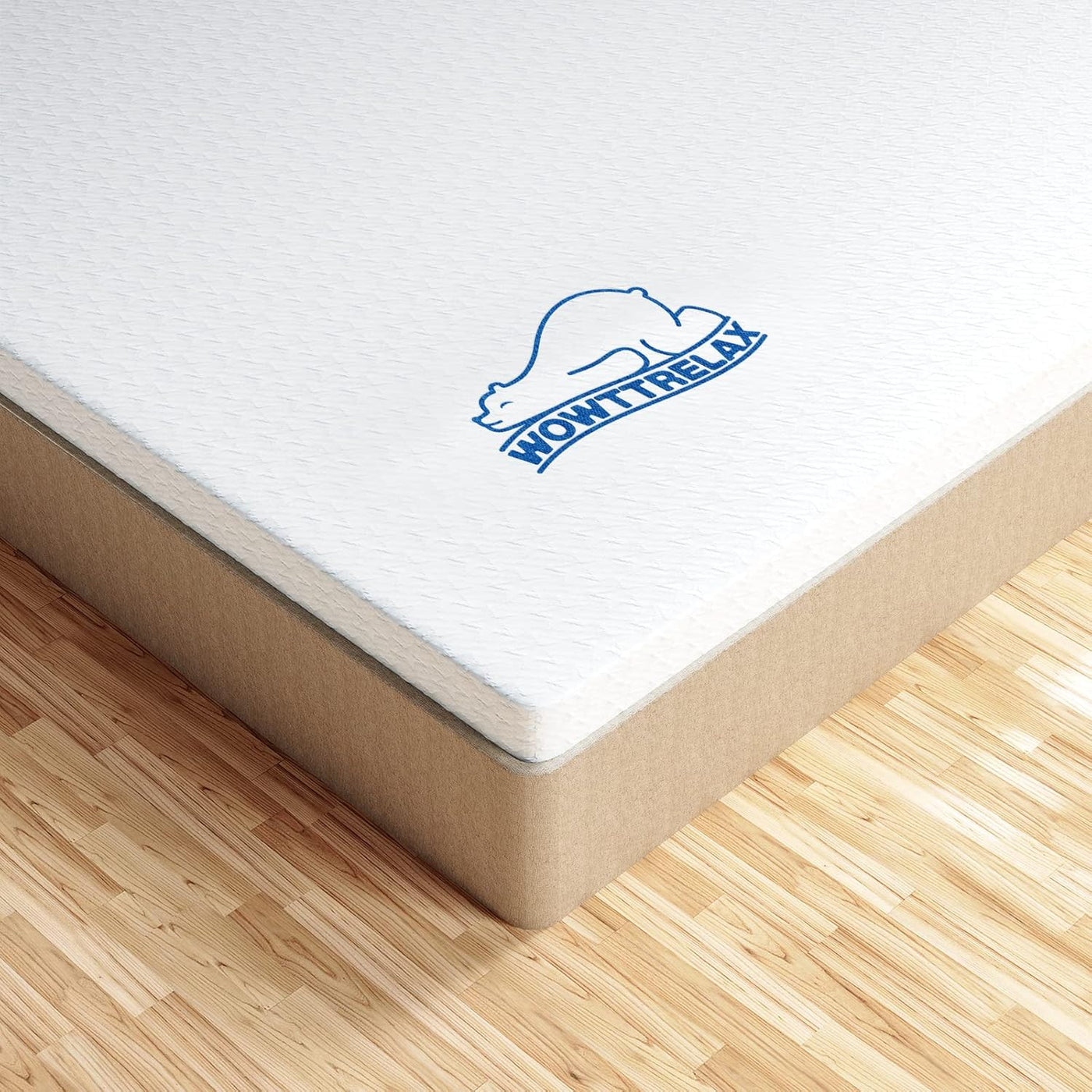 Mattress corner with 'NOW I RELAX' logo on a wooden floor
