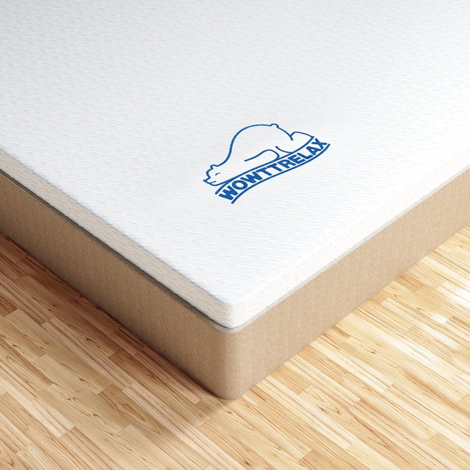 Mattress corner with 'NOW I RELAX' logo on a wooden floor