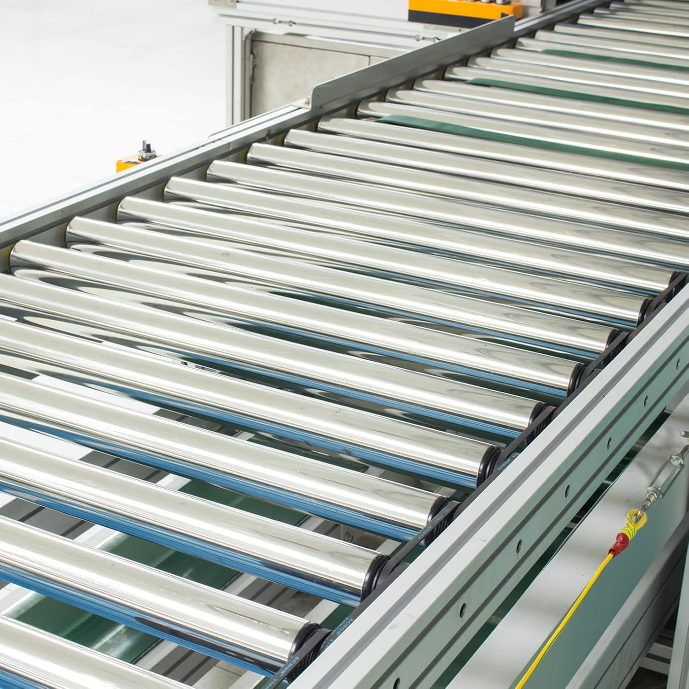 Roller conveyor system in a factory setting