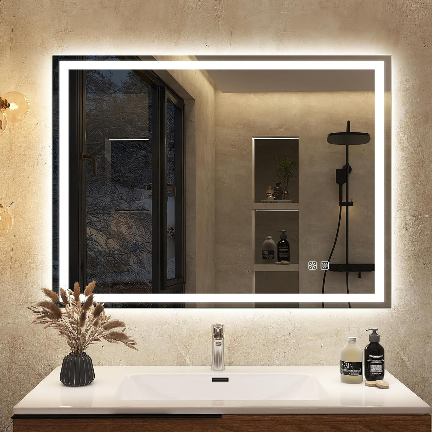 Bathroom with a large illuminated mirror above a sink
