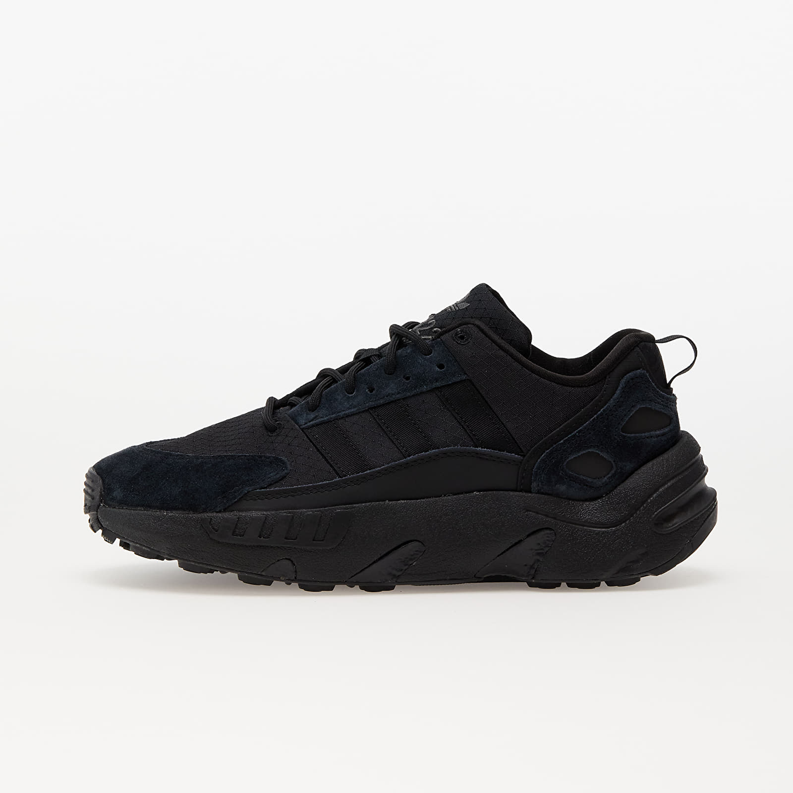 Black Adidas sneaker on a white background