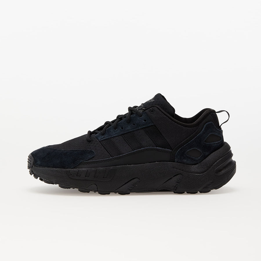 Black Adidas sneaker on a white background
