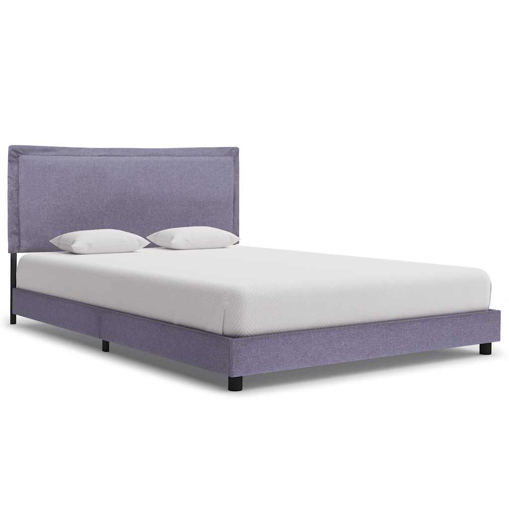 Purple upholstered bed with white mattress and pillows on a white background