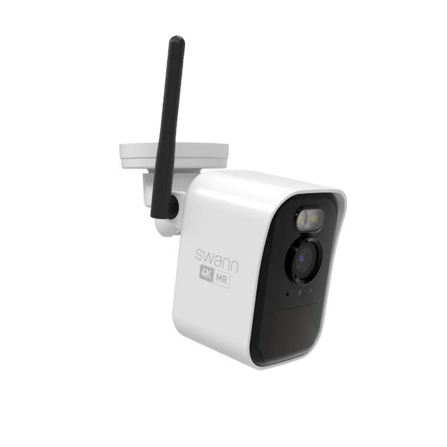 White security camera with antenna on a white background