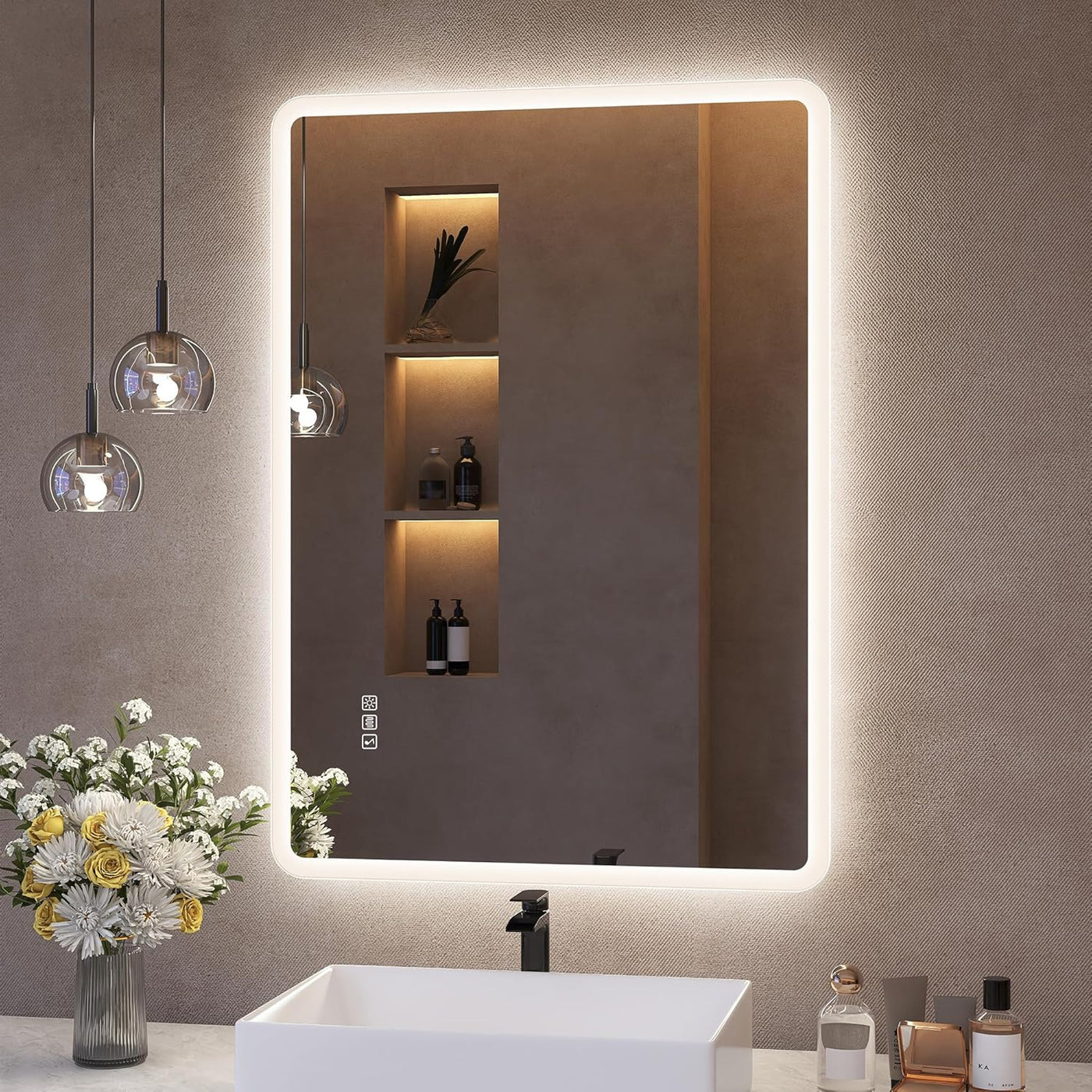 Bathroom with a large illuminated mirror, sink, and decorative elements.