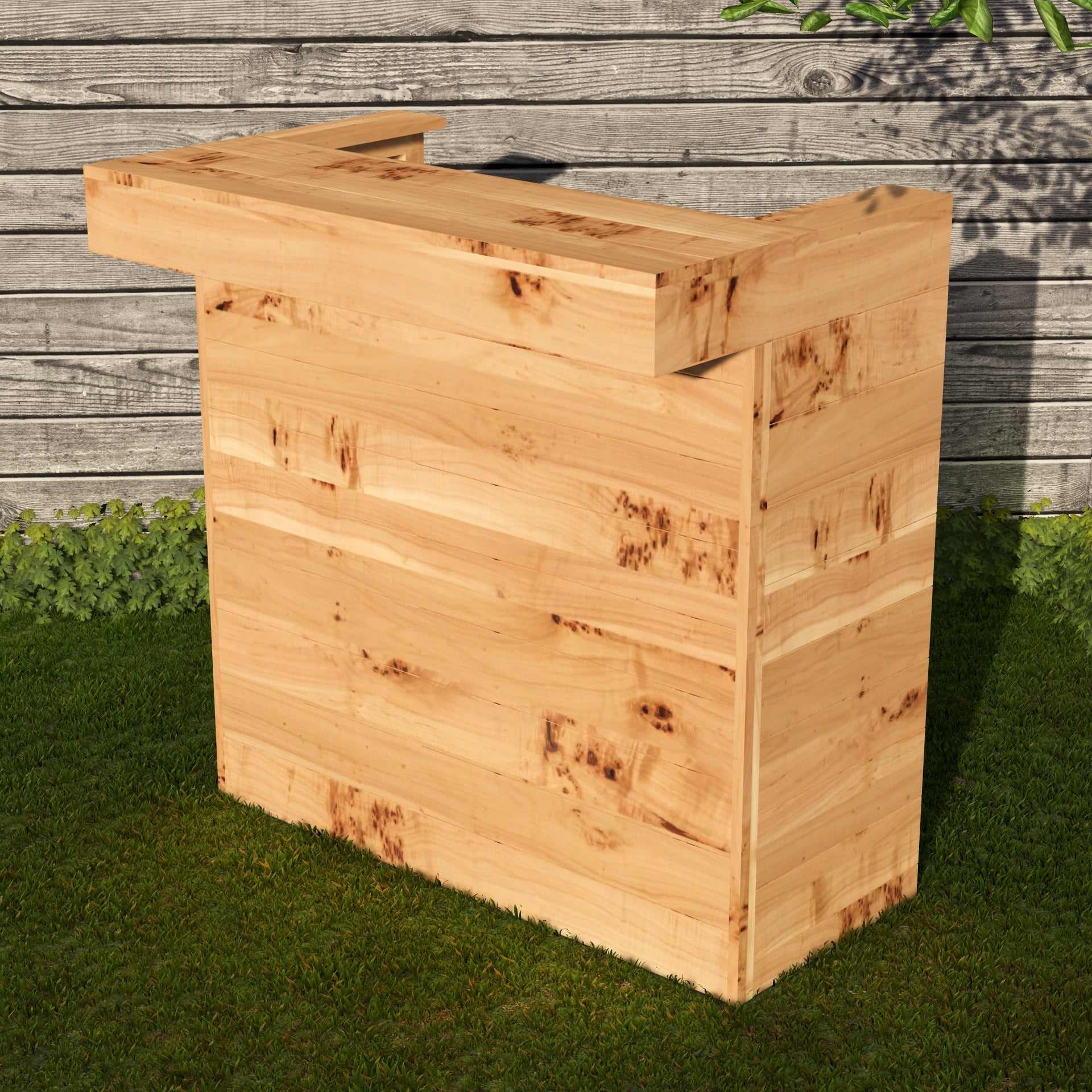Wooden outdoor bar against a wooden wall with grass below