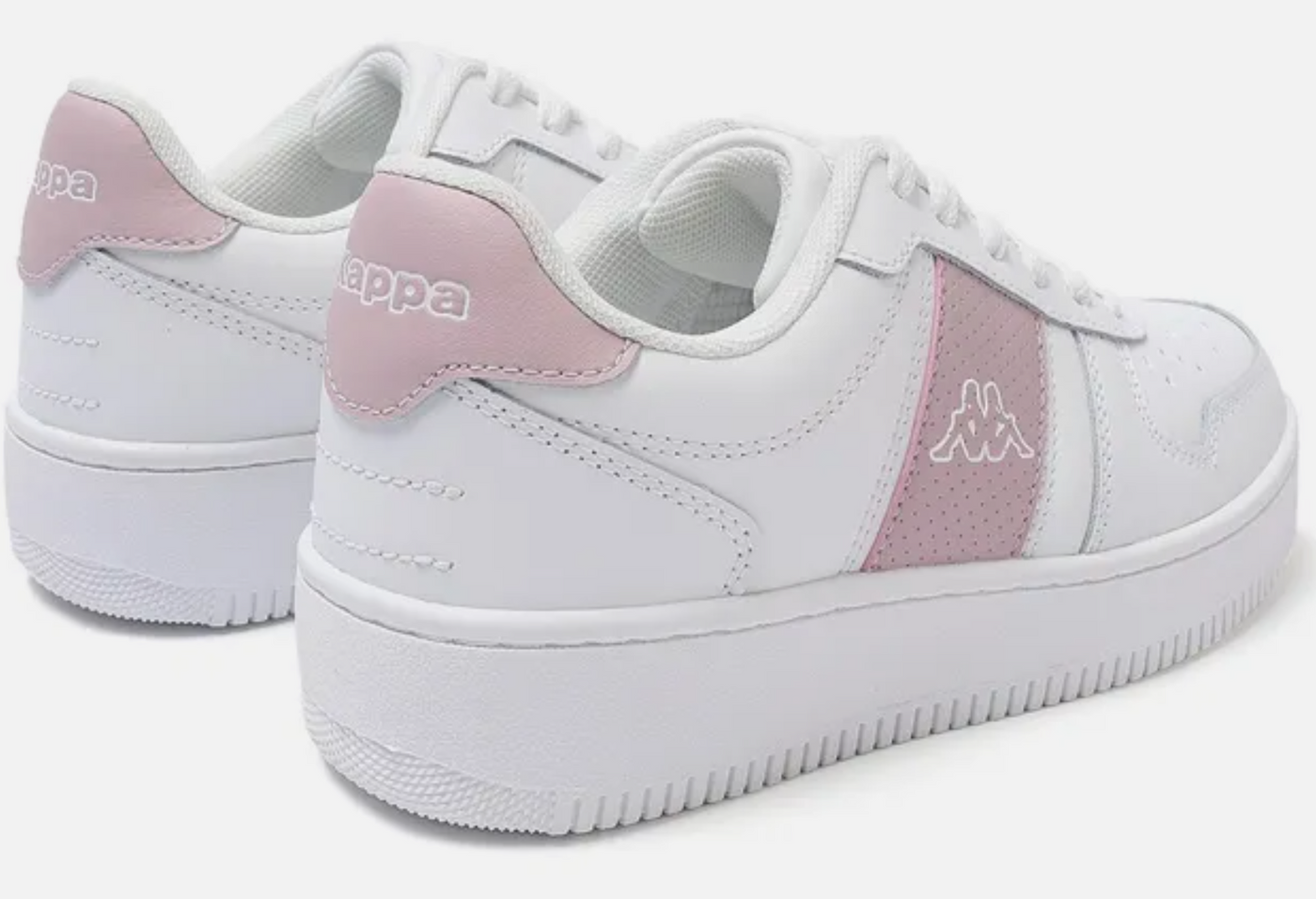 White sneakers with pink accents on a white background