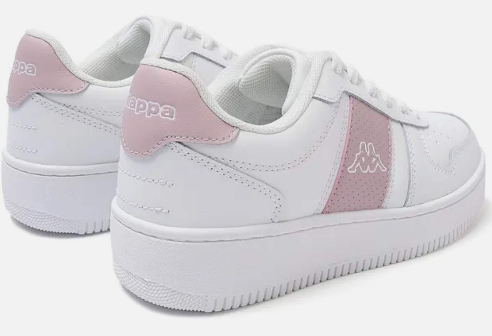 White sneakers with pink accents on a white background