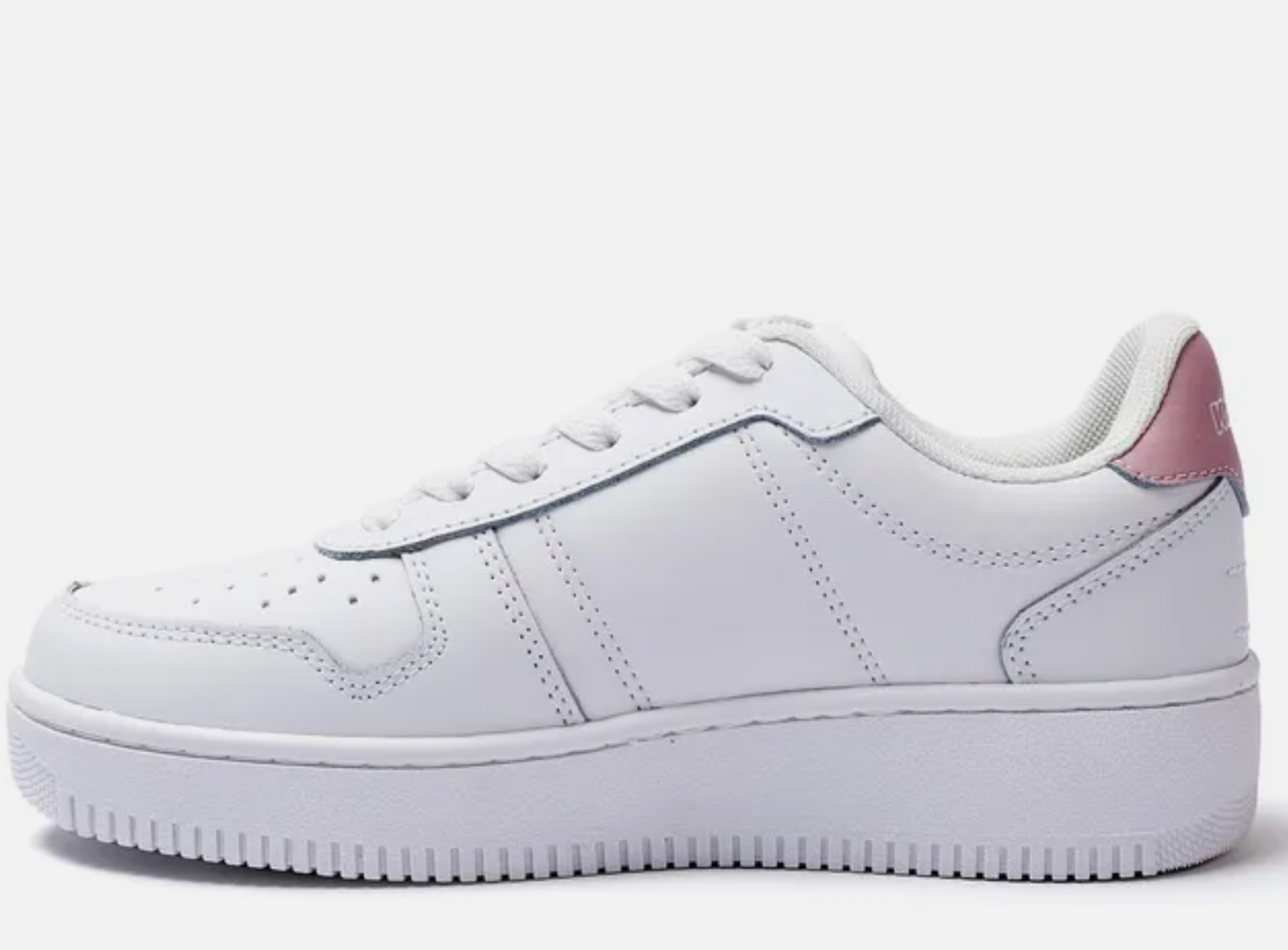 White sneaker with pink heel on a white background