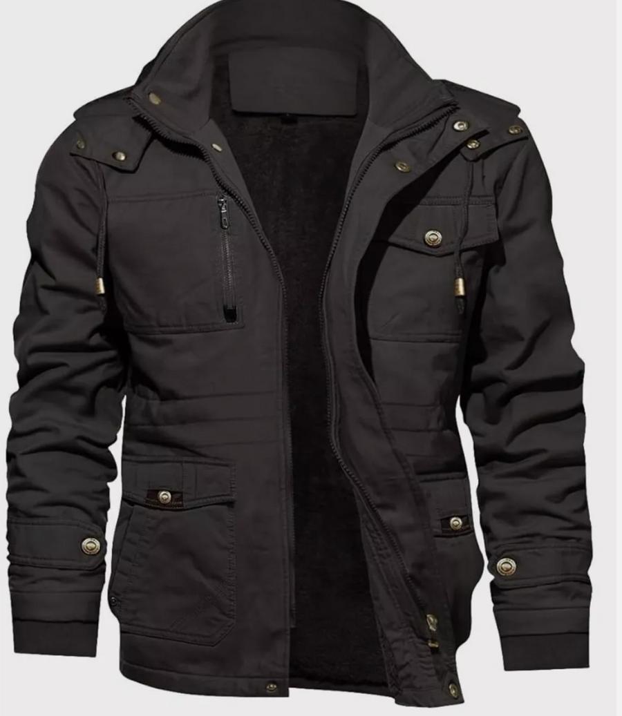 Black jacket with buttons and zippers on a white background