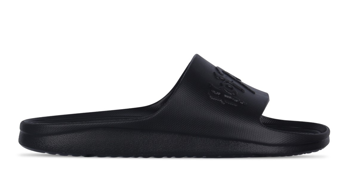 Black slide sandal on a white background