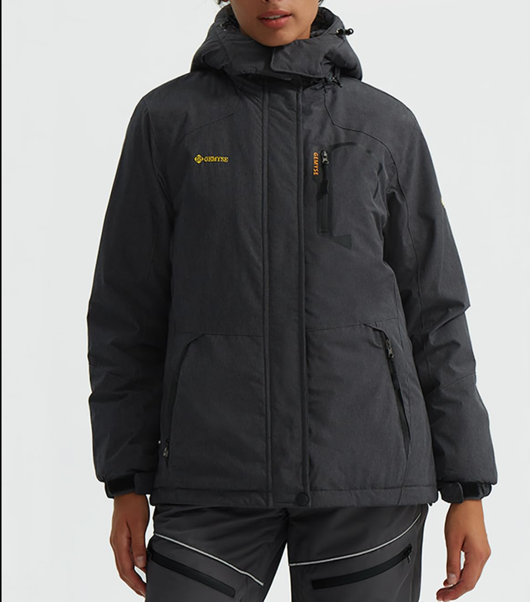 Person wearing a black jacket with a brand logo on a white background