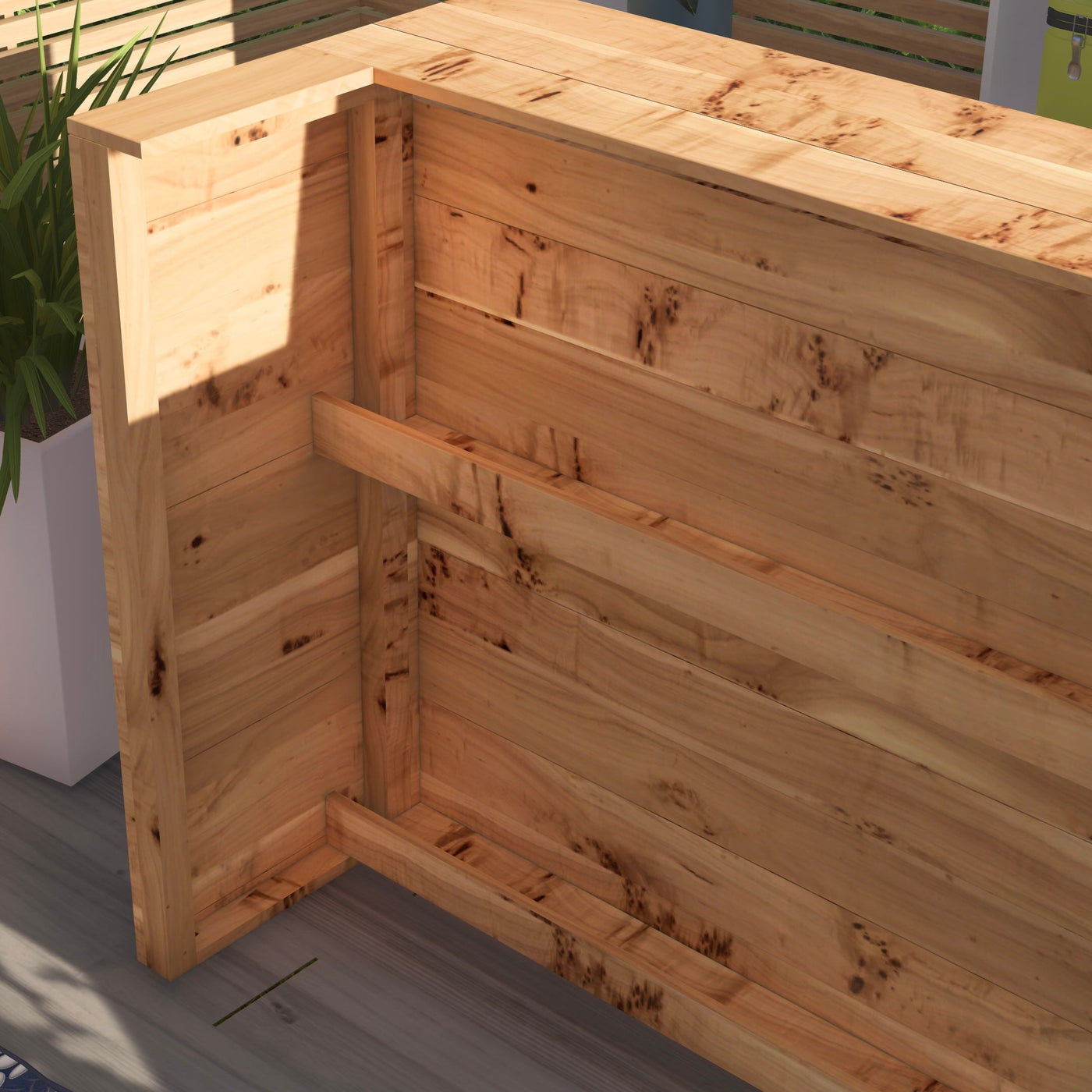 Wooden storage box with one side open on a gray surface