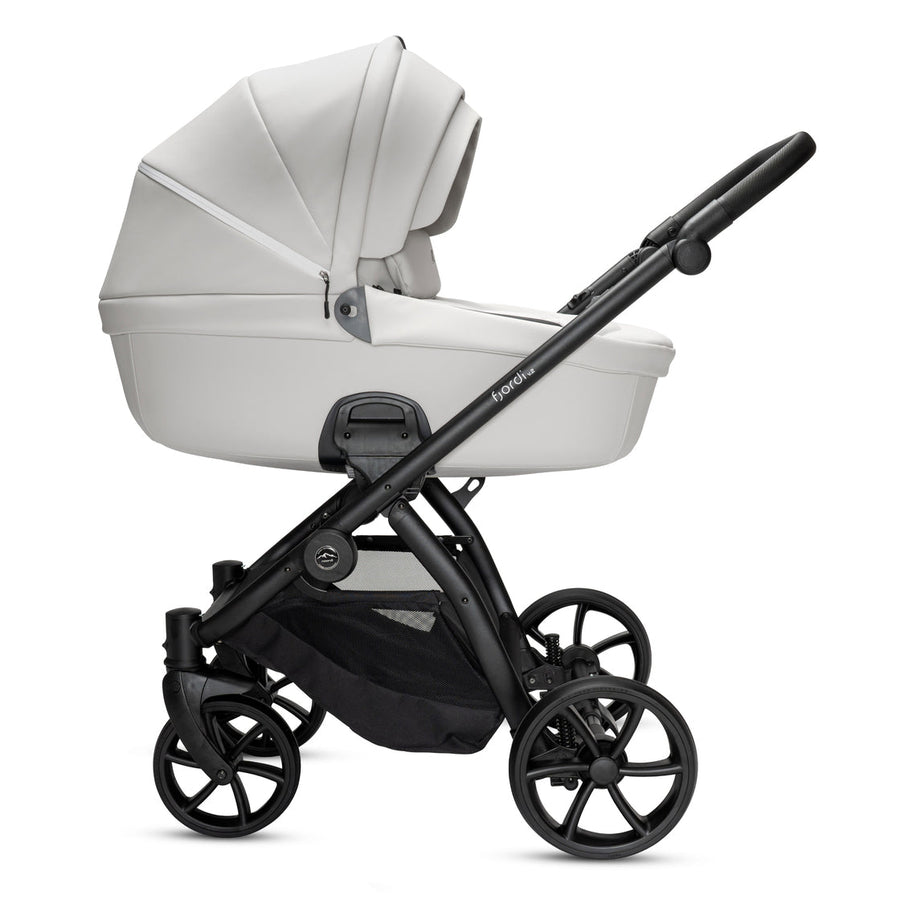 Baby stroller with a white seat and black frame on a white background