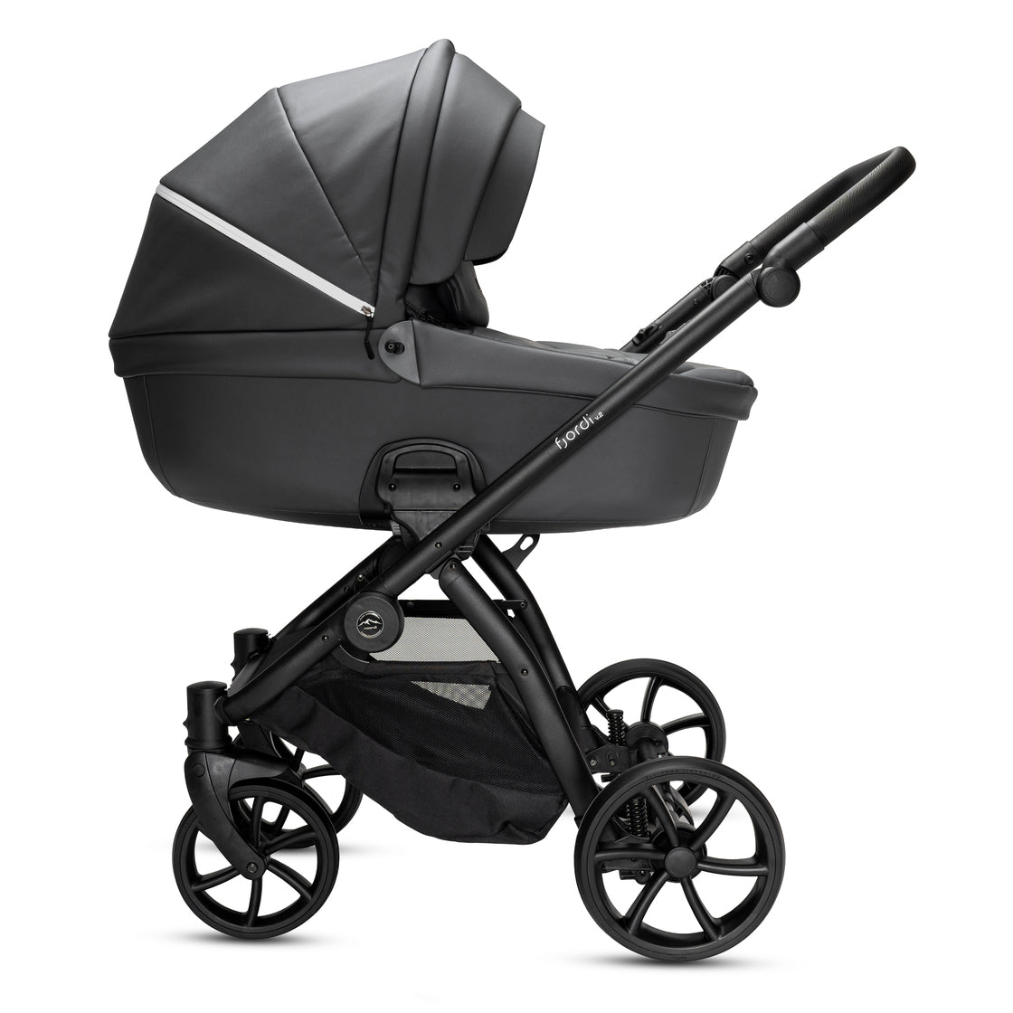 Green and black stroller on a white background